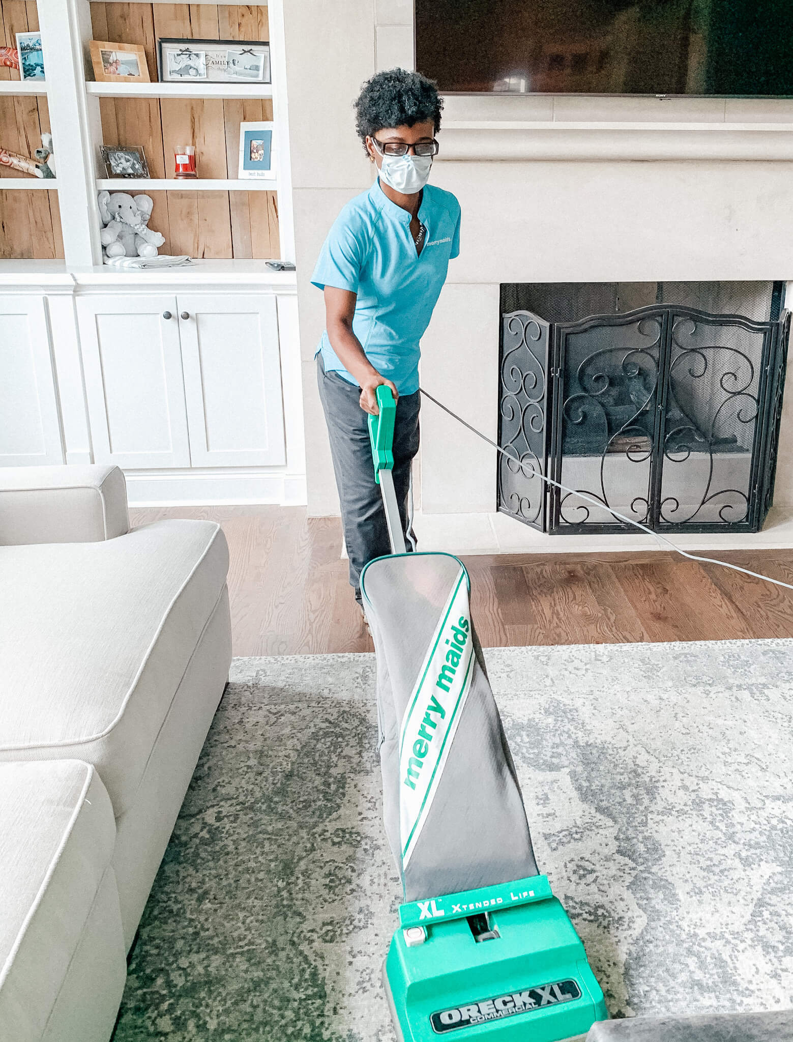 Hammond cleaning professional vacuuming a grey rug