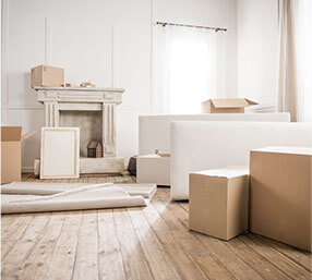 Boxes in living space ready for move out cleaning services